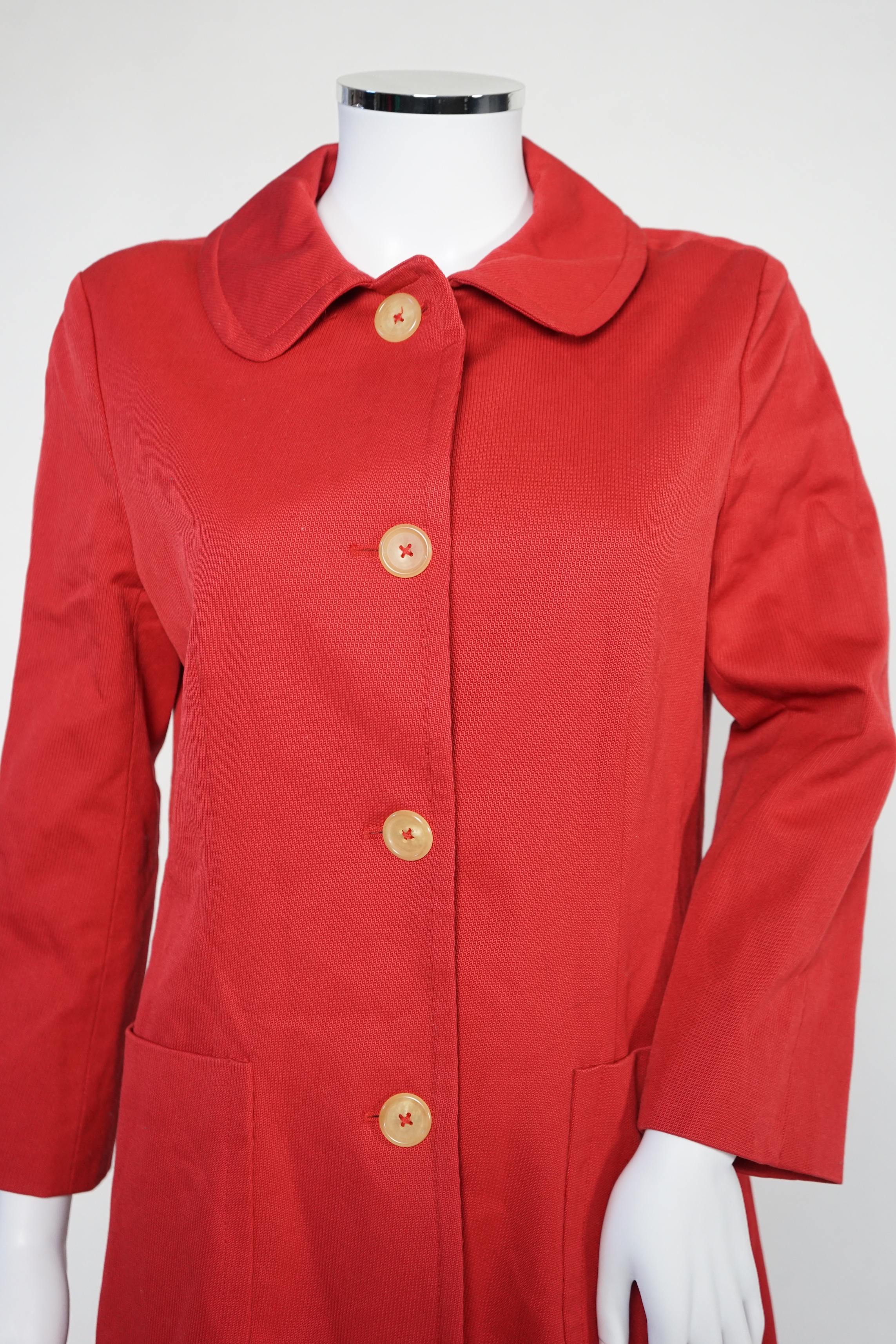 A DKNY red lady's coat and a DKNY satin jacket, coat size 6, jacket size 8